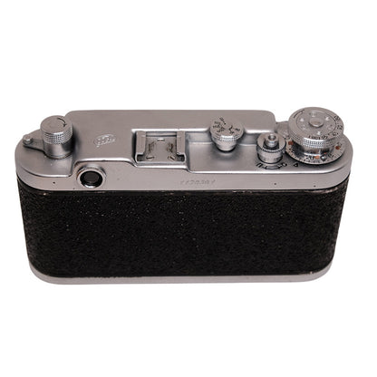 Fed 2 vintage film camera with Industar N-61 53mm f/2.8 lens, black metal body and viewfinder, photographed on a neutral background.