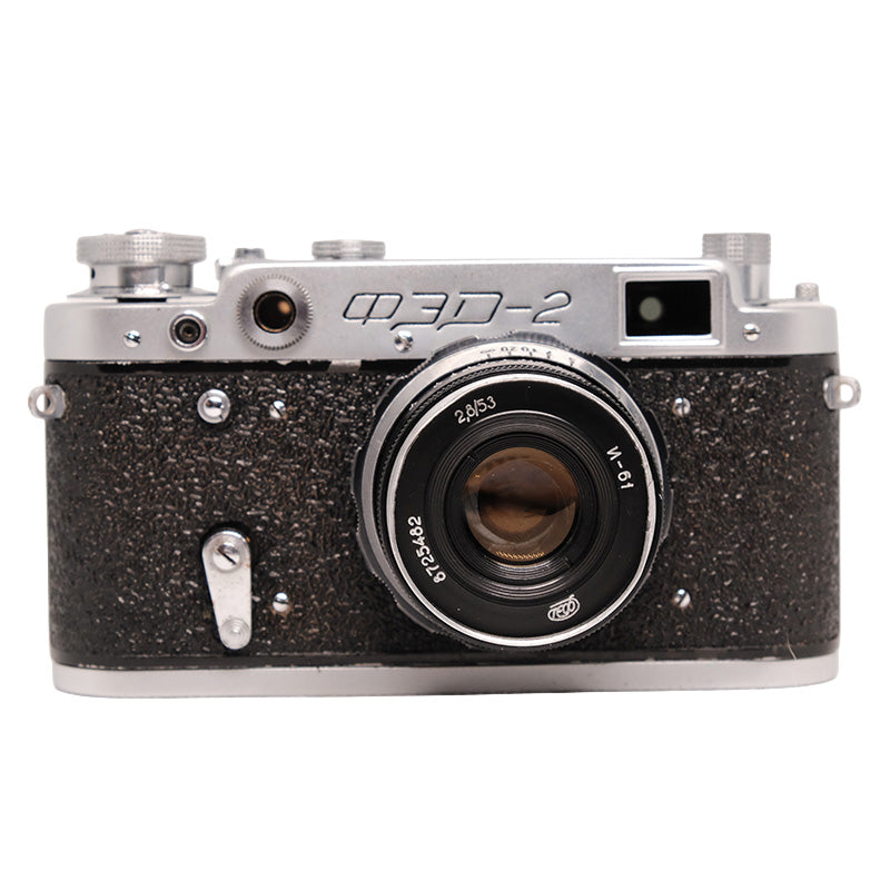 FED 2 camera with Industar N-61 53mm f/2.8 lens, vintage black camera body and lens setup, detailed close-up shot