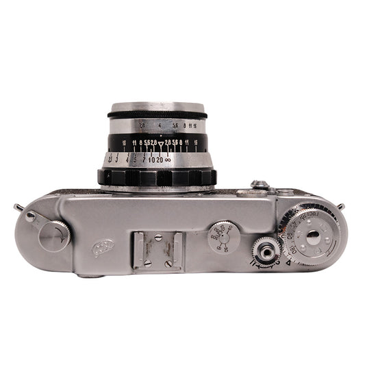 FED 2 rangefinder camera with Industar N-61 53mm f/2.8 lens, vintage camera and lens set on a neutral background.