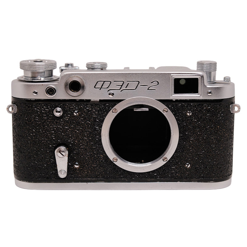 FED 2 camera with Industar N-61 53mm f/2.8 lens, vintage black camera body with silver accents, close-up view