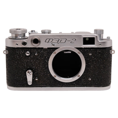 FED 2 camera with Industar N-61 53mm f/2.8 lens, vintage black camera body with silver accents, close-up view