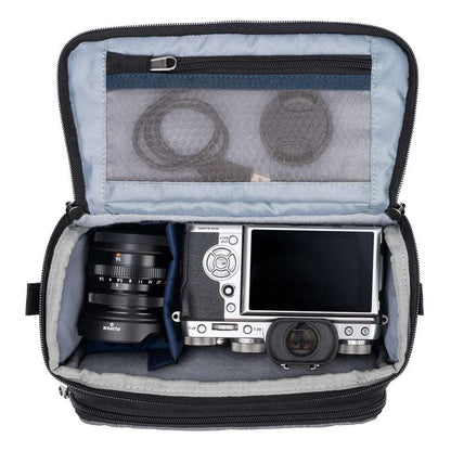 Cool grey ThinkTank Mirrorless Mover 20 v2 photo bag with adjustable straps and multiple compartments for camera gear.