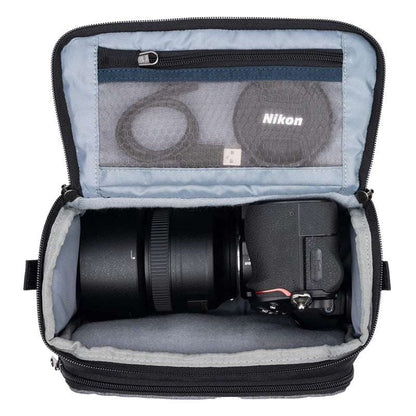ThinkTank Mirrorless Mover 20 v2 in Cool Grey, showcasing a compact camera bag with adjustable strap and organized pockets.