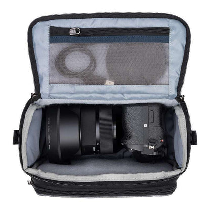 ThinkTank Mirrorless Mover 20 v2 bag in Cool Grey, showcasing exterior design and storage compartments for camera gear.