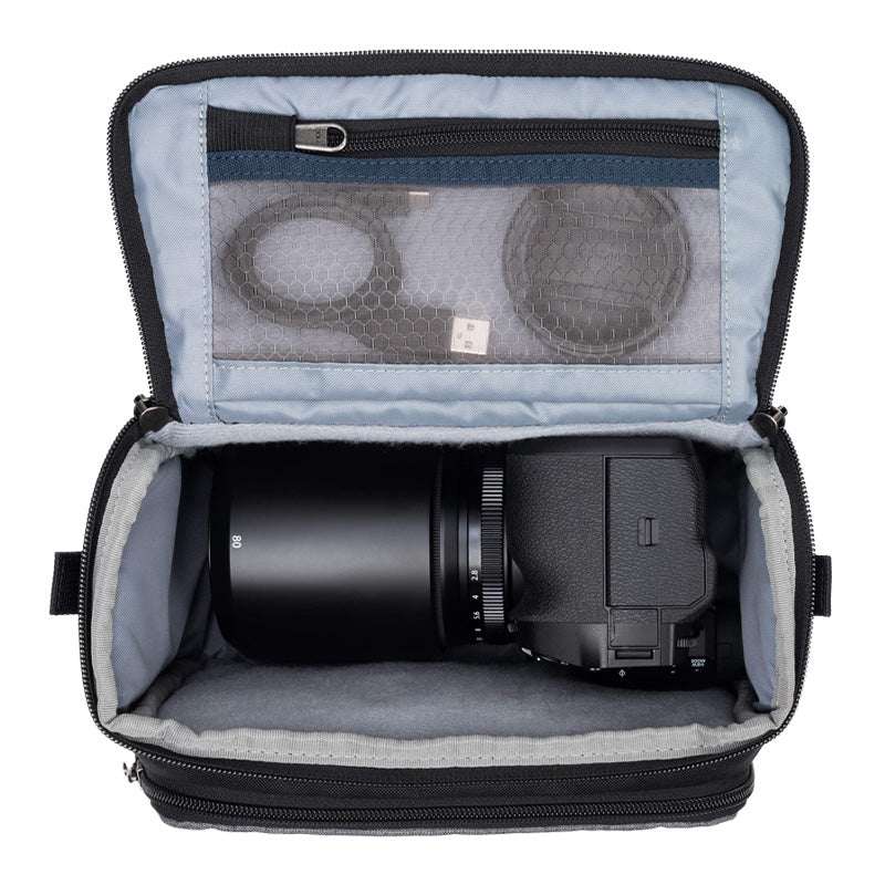 Cool Grey ThinkTank Mirrorless Mover 20 v2 photo bag with padded compartments for camera gear and accessories.
