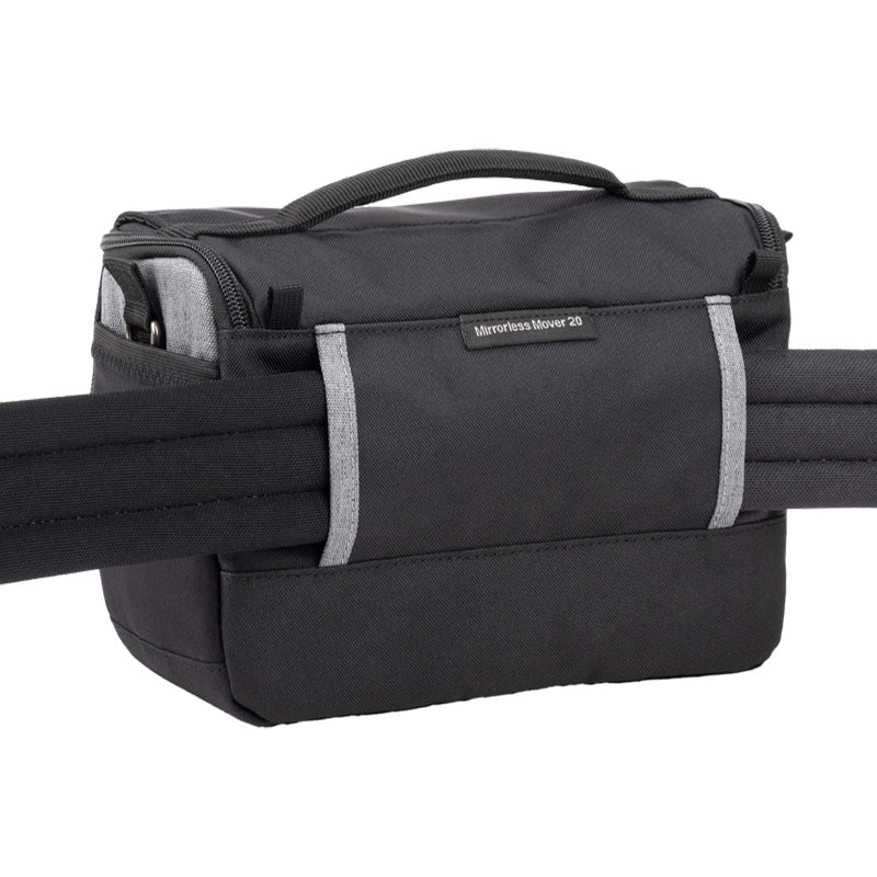 Cool grey ThinkTank Mirrorless Mover 20 v2 camera bag with adjustable shoulder strap and spacious compartments.
