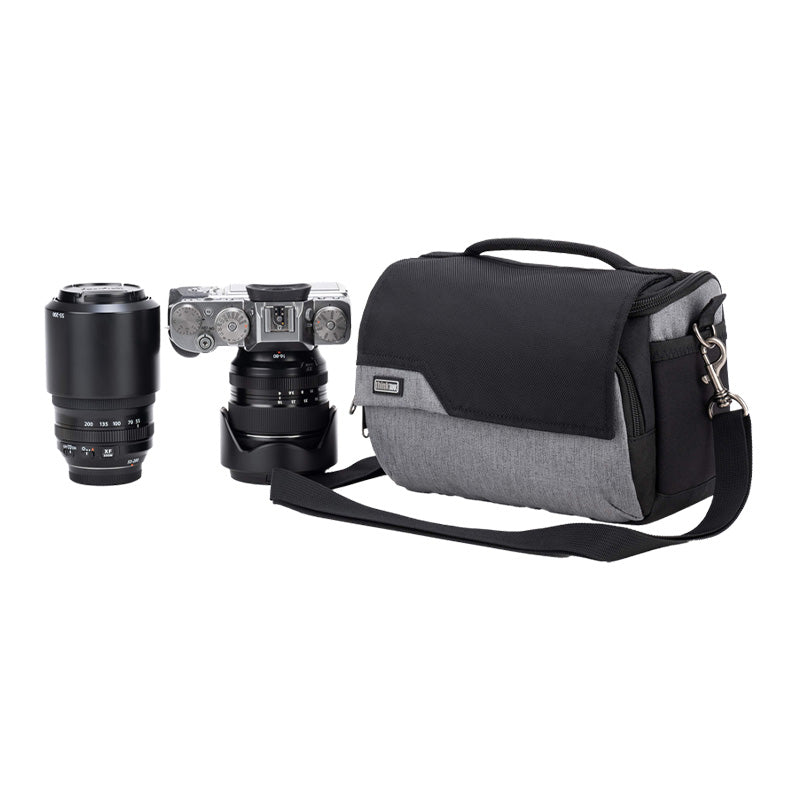 Cool grey ThinkTank Mirrorless Mover 20 v2 camera bag with adjustable strap and padded compartments for gear protection.