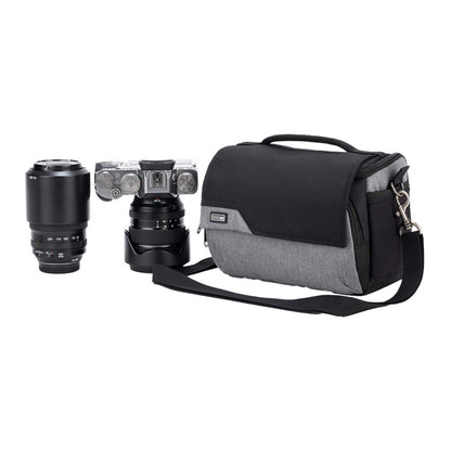Cool grey ThinkTank Mirrorless Mover 20 v2 camera bag with adjustable strap and padded compartments for gear protection.