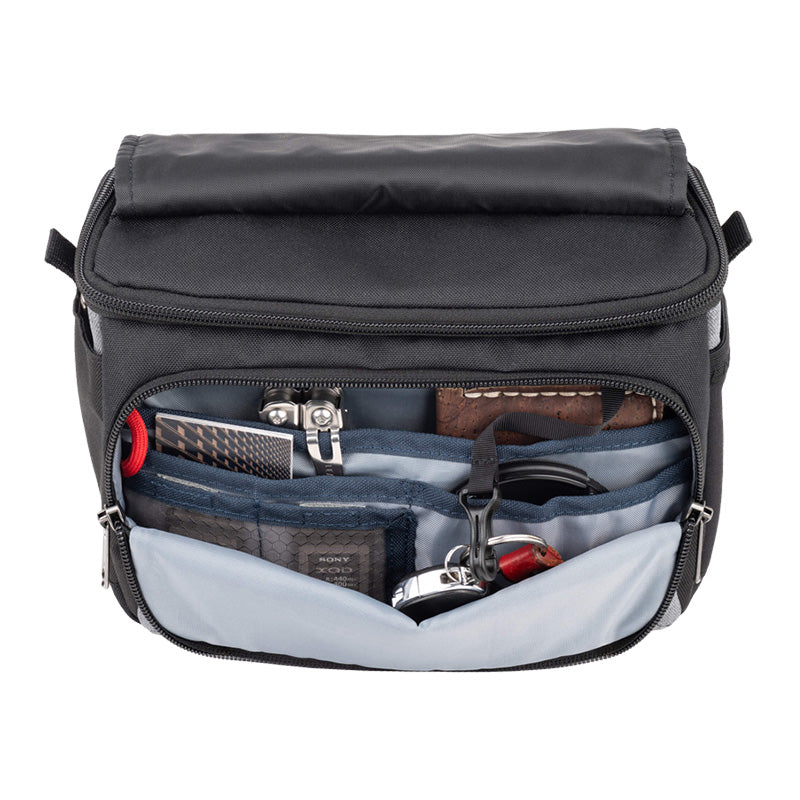 Cool grey ThinkTank Mirrorless Mover 20 v2 camera bag with adjustable dividers and padded compartments.