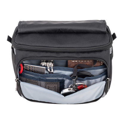 Cool grey ThinkTank Mirrorless Mover 20 v2 camera bag with adjustable dividers and padded compartments.