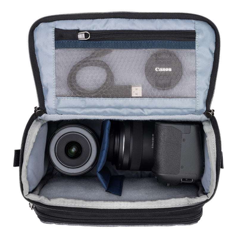 ThinkTank Mirrorless Mover 20 v2 in Cool Grey, showcasing its sleek design and spacious compartments for camera gear.